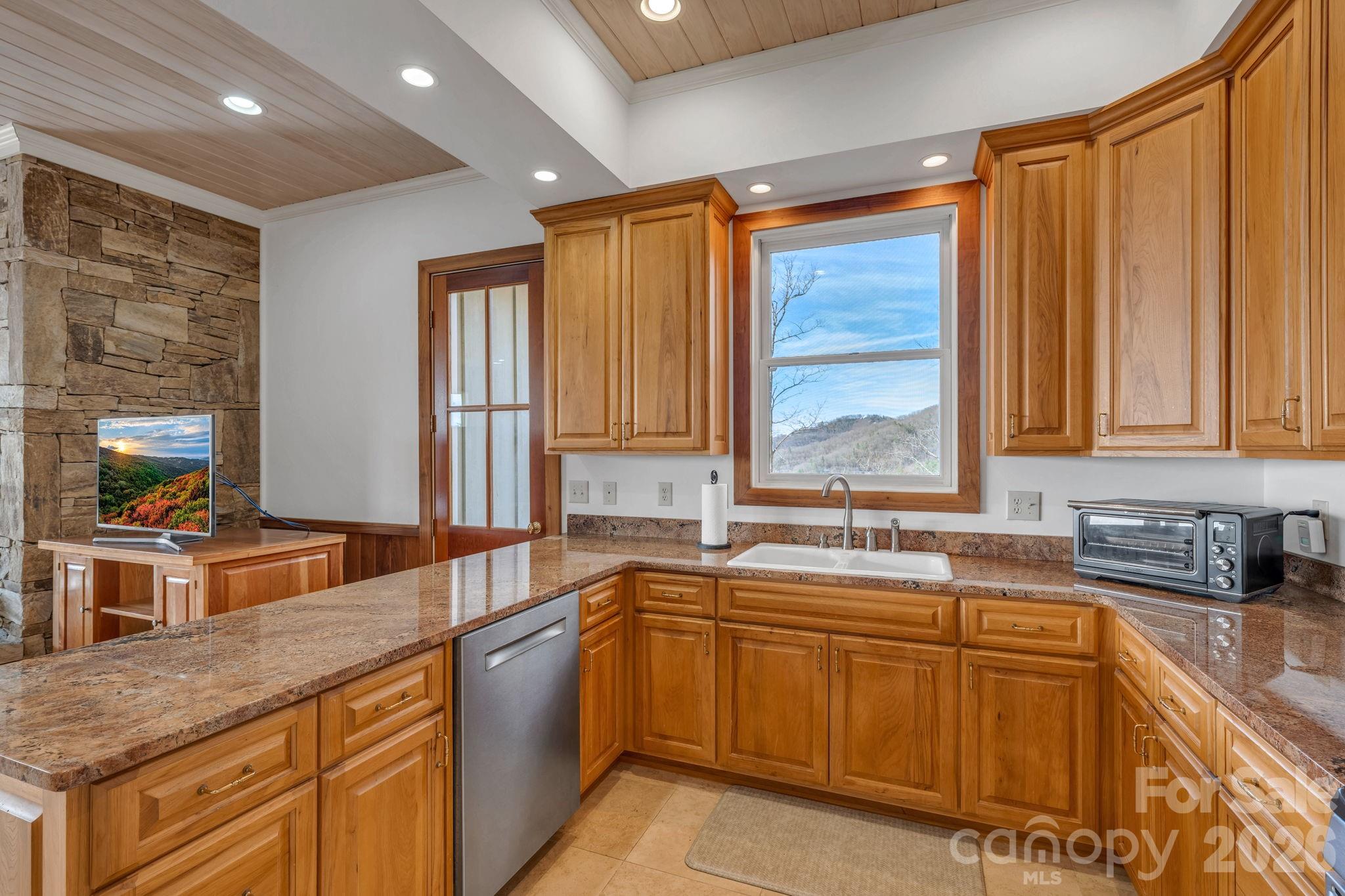 933 Thunder Ridge Lane, Unit 4 & 2 Lenoir, NC 28645 - Photo 4 of 45 a kitchen that has a sink and a stove in it