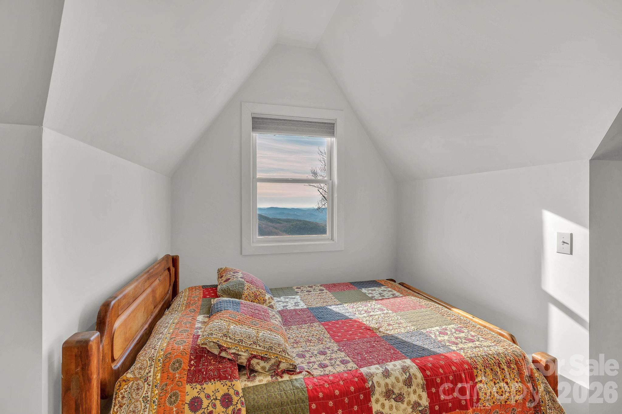 933 Thunder Ridge Lane, Unit 4 & 2 Lenoir, NC 28645 - Photo 42 of 45 a bedroom with a bed and a window