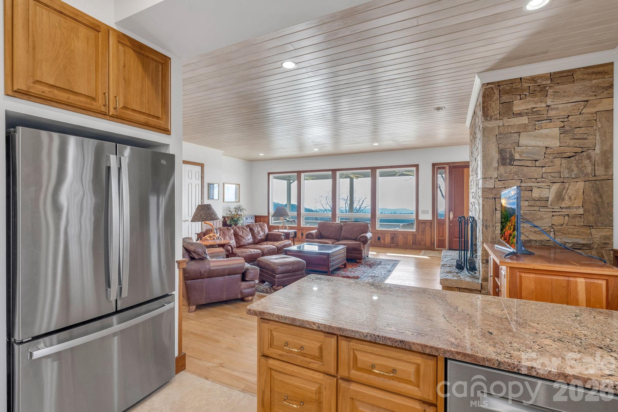 933 Thunder Ridge Lane, Unit 4 & 2 Lenoir, NC 28645 - Photo 10 of 45 a kitchen with stainless steel appliances granite countertop a refrigerator and a sink