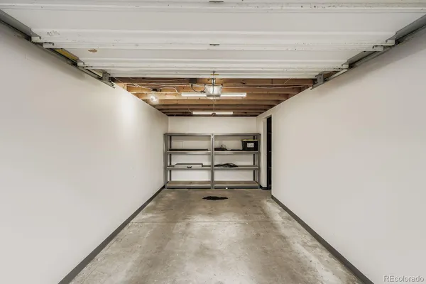 a view of room with a ceiling fan