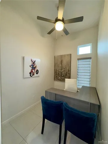 a kitchen with a stove top oven and cabinets