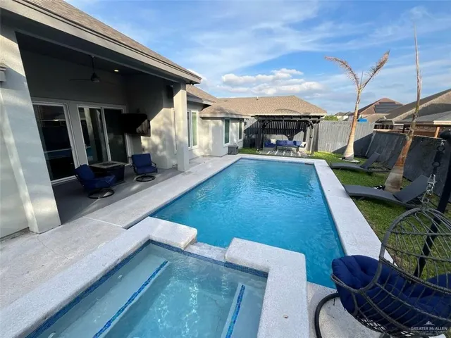 a living room with patio furniture