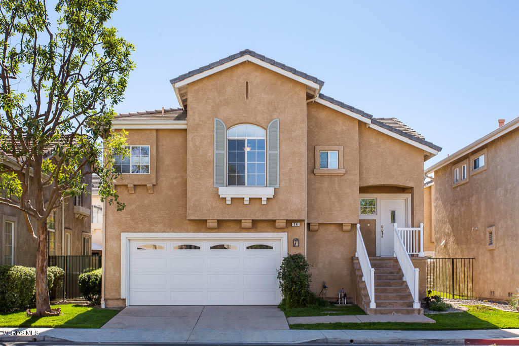 74 Bending Branch Way Simi Valley, CA 93065 - Photo 1 of 41 a front view of a house with garden