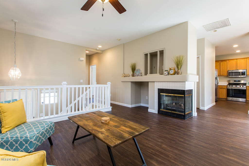 74 Bending Branch Way Simi Valley, CA 93065 - Photo 2 of 41 a living room with furniture and a fireplace