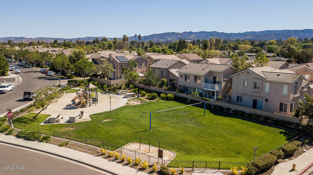 74 Bending Branch Way Simi Valley, CA 93065 - Photo 14 of 41 a view of a swimming pool with a garden