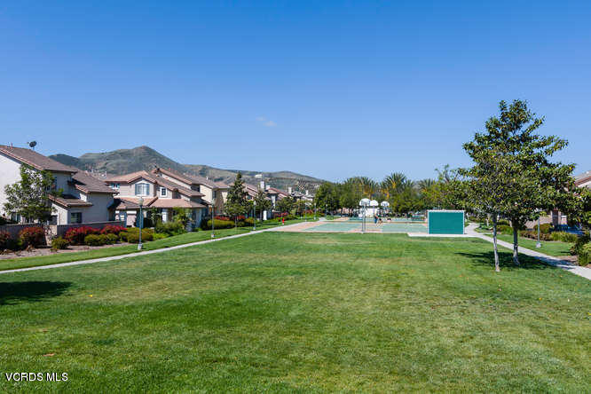 74 Bending Branch Way Simi Valley, CA 93065 - Photo 21 of 41 a view of a big house with a big yard and large trees