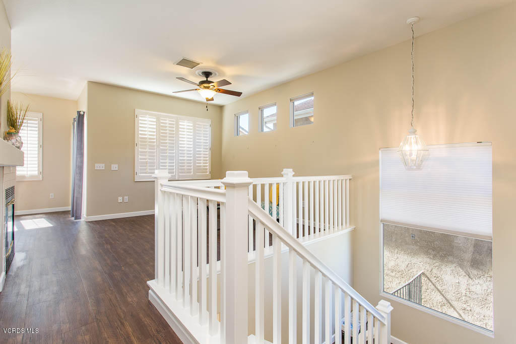 74 Bending Branch Way Simi Valley, CA 93065 - Photo 22 of 41 a view of a hallway with wooden floor and entryway