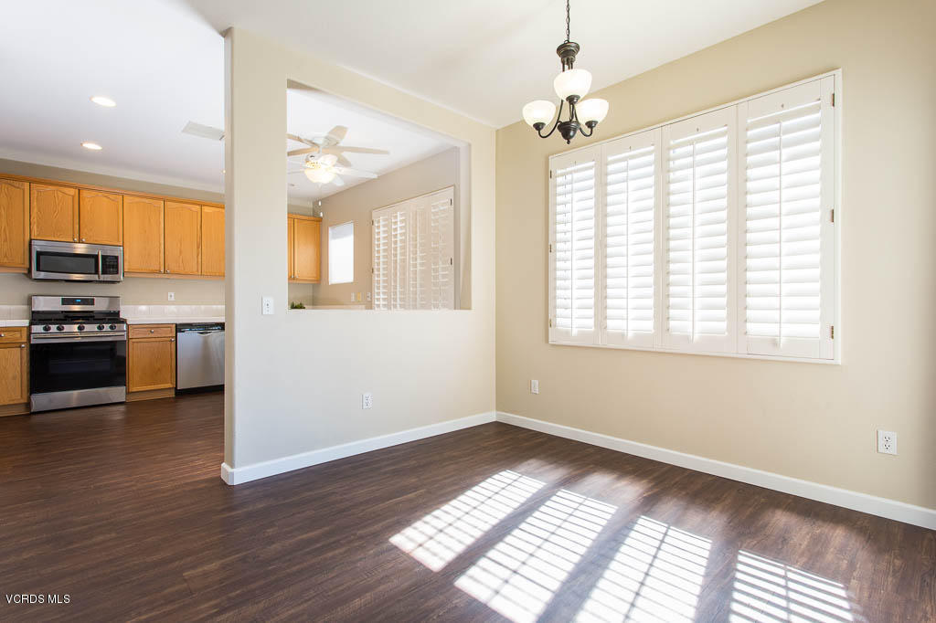 74 Bending Branch Way Simi Valley, CA 93065 - Photo 25 of 41 a view of an empty room with kitchen and a window