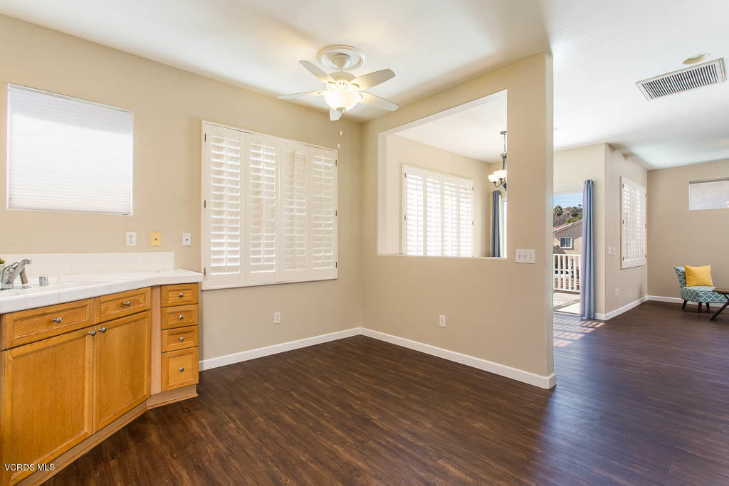 74 Bending Branch Way Simi Valley, CA 93065 - Photo 26 of 41 a view of an empty room with wooden floor and a window