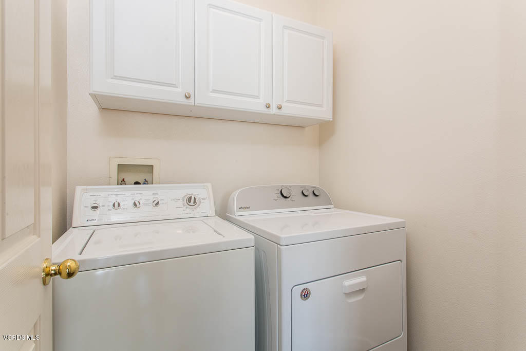 74 Bending Branch Way Simi Valley, CA 93065 - Photo 29 of 41 a utility room with dryer and washer