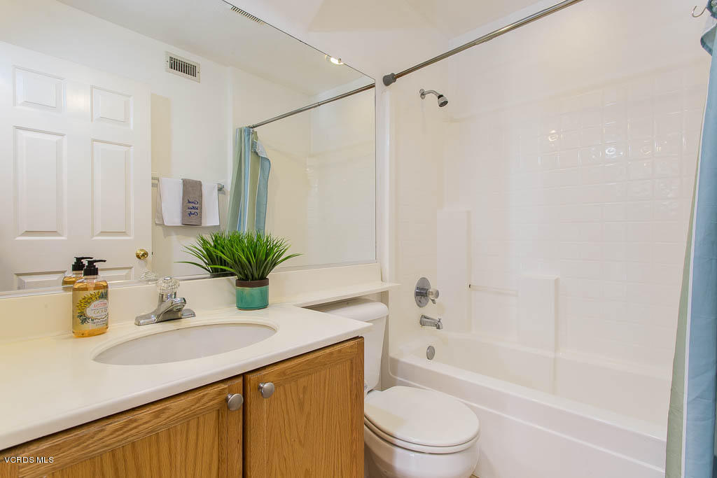 74 Bending Branch Way Simi Valley, CA 93065 - Photo 33 of 41 a bathroom with a granite countertop sink a toilet and shower