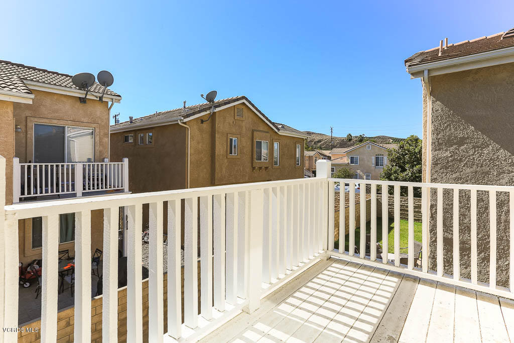 74 Bending Branch Way Simi Valley, CA 93065 - Photo 37 of 41 a view of a wooden house with a small yard