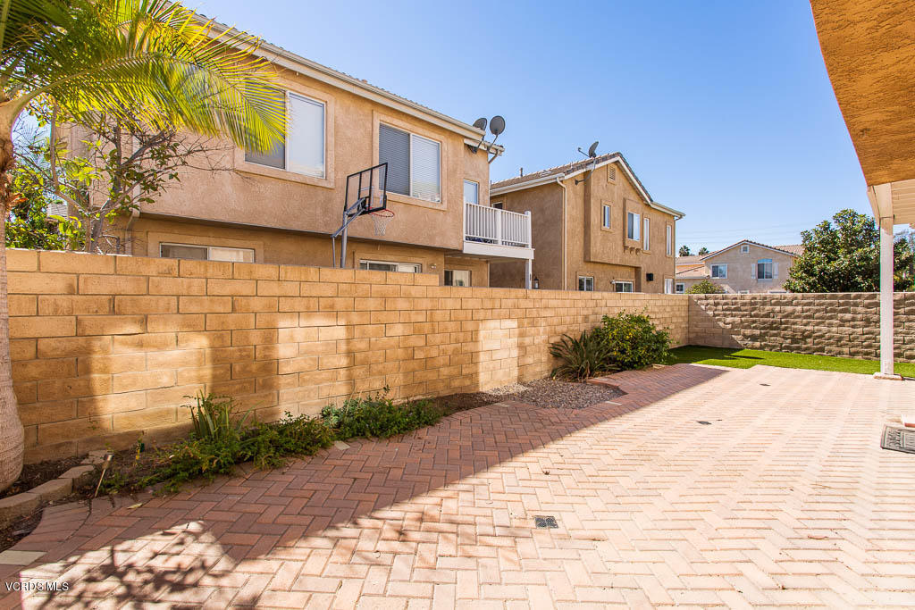 74 Bending Branch Way Simi Valley, CA 93065 - Photo 38 of 41 a front view of a house with a yard