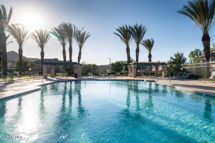 74 Bending Branch Way Simi Valley, CA 93065 - Photo 5 of 41 a view of swimming pool with a table and chairs