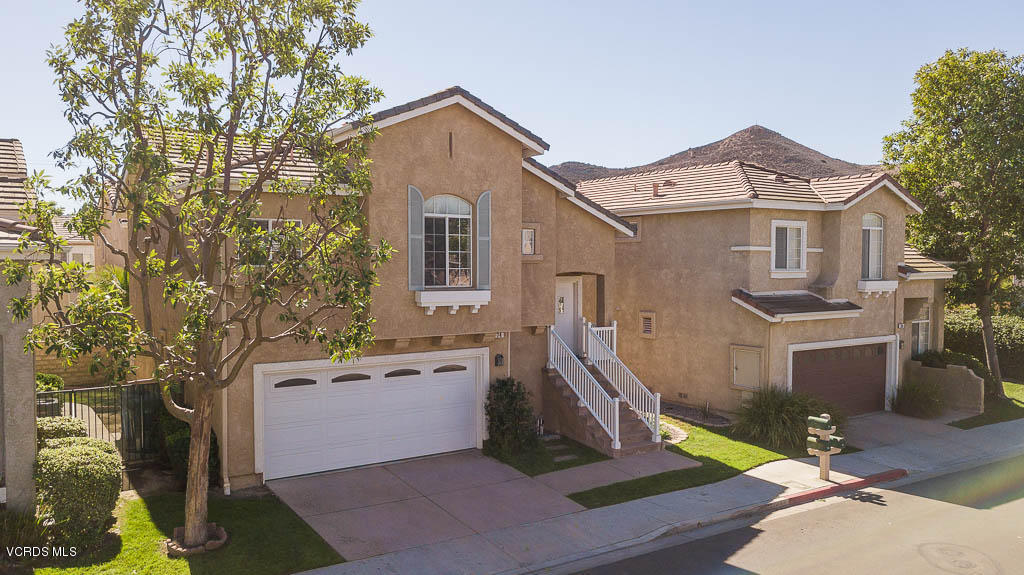 74 Bending Branch Way Simi Valley, CA 93065 - Photo 7 of 41 a aerial view of a house with a yard