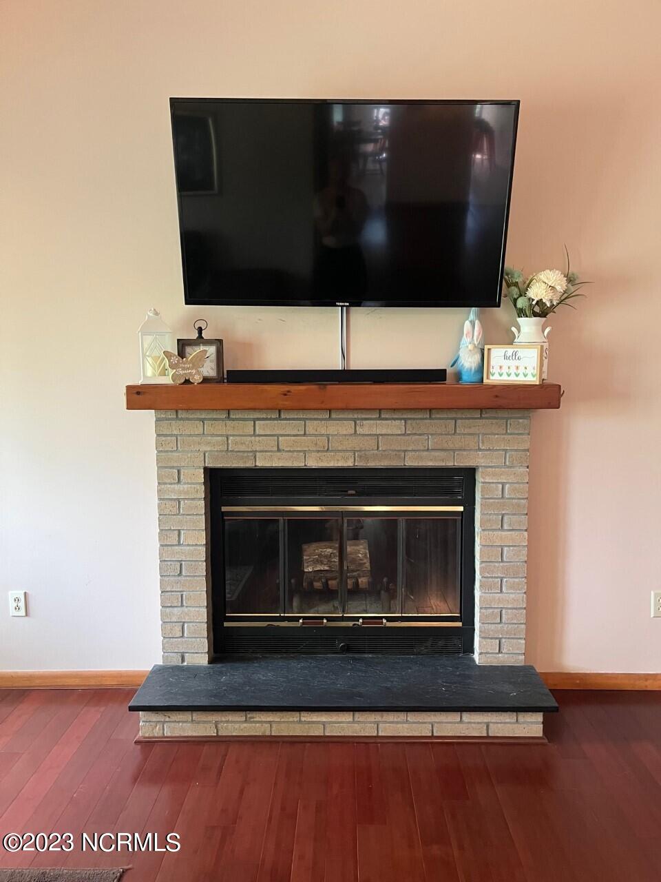 402 Ravenswood Road Hampstead, NC 28443 - Photo 13 of 130 Living Room Fireplace