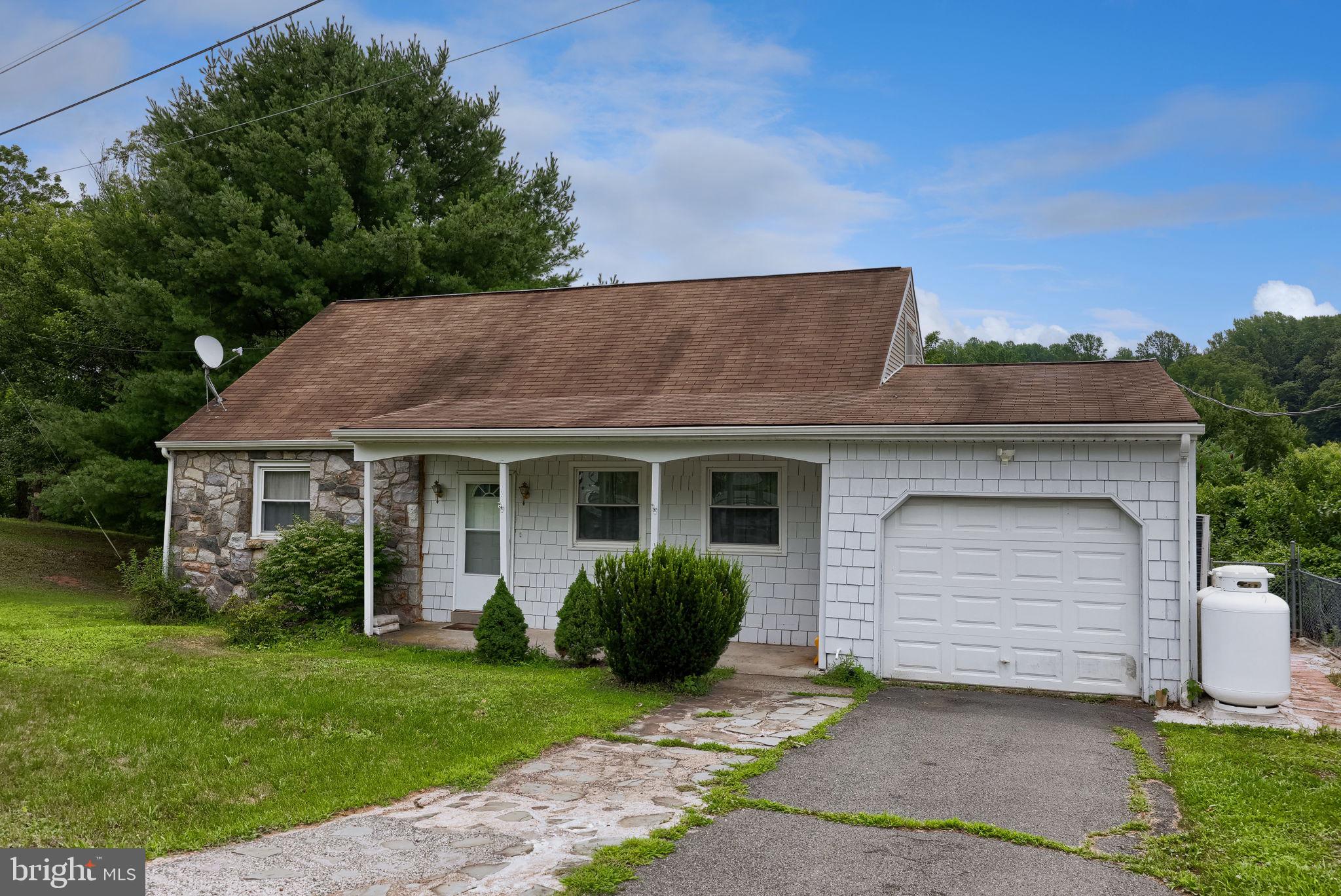 26 Golf Acres Road Mohnton, PA 19540 - Photo 39 of 49 Charming home with lush greenery.