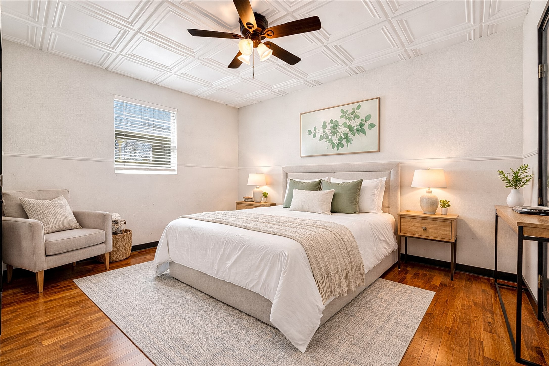 6915 Providence Avenue Austin, TX 78752 - Photo 17 of 27 a bedroom with a bed and a couch