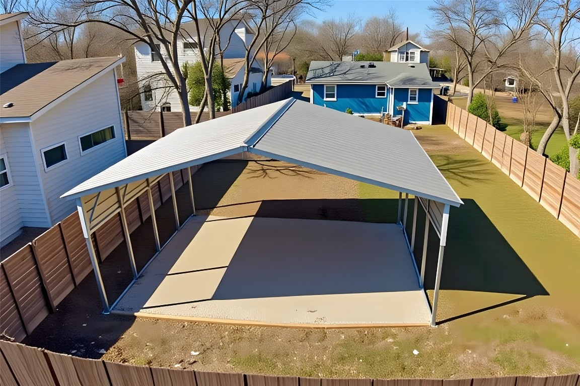 6915 Providence Avenue Austin, TX 78752 - Photo 2 of 27 Aerial view of the back of the home featuring a carport