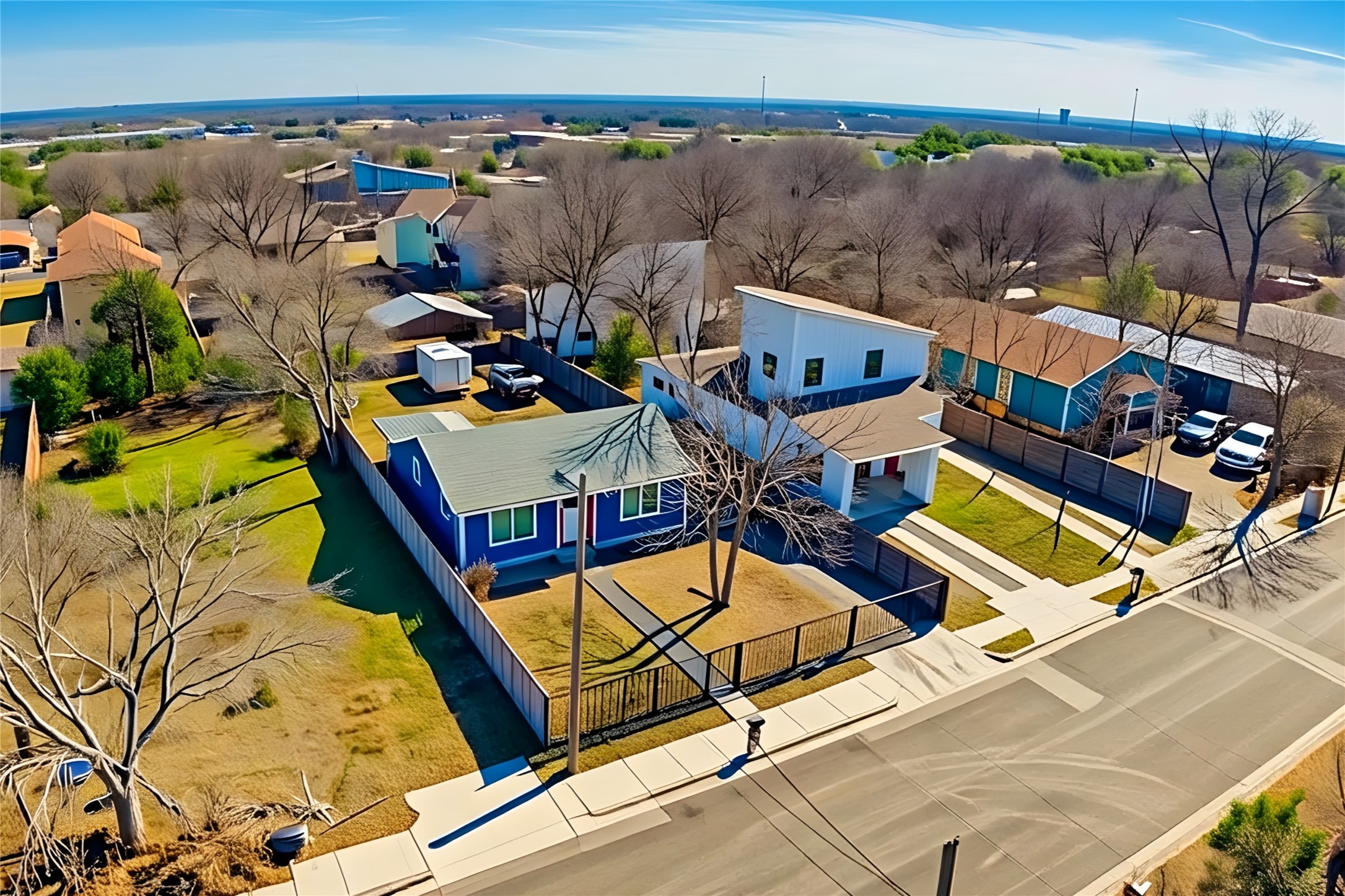 6915 Providence Avenue Austin, TX 78752 - Photo 24 of 27 an aerial view of residential houses with outdoor space
