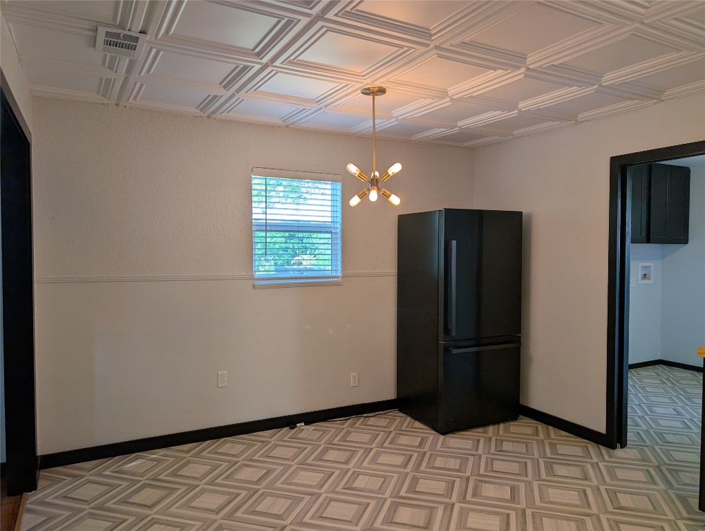 6915 Providence Avenue Austin, TX 78752 - Photo 9 of 27 Kitchen featuring a refridgerator