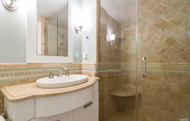 a view of a dinning table and chairs on roof deck