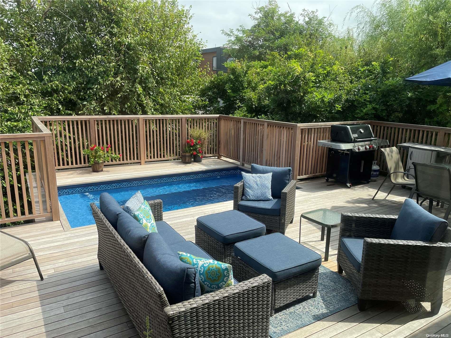 207 Wilmot Road Ocean Beach, NY 11770 - Photo 20 of 24 a view of a deck with furniture