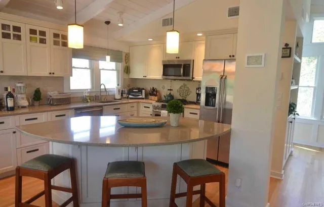 a view of a dining room with furniture