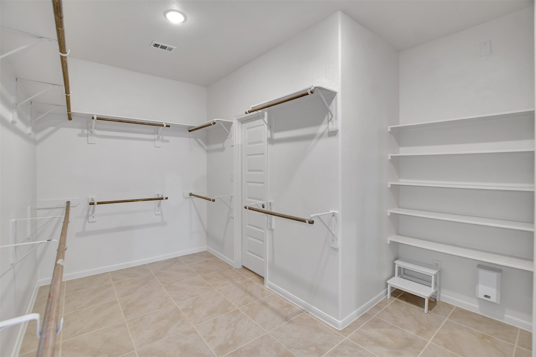 246 Peninsula Point Drive Montgomery, TX 77356 - Photo 24 of 46 Huge walk in closet with a separate door to the laundry room for your convenience