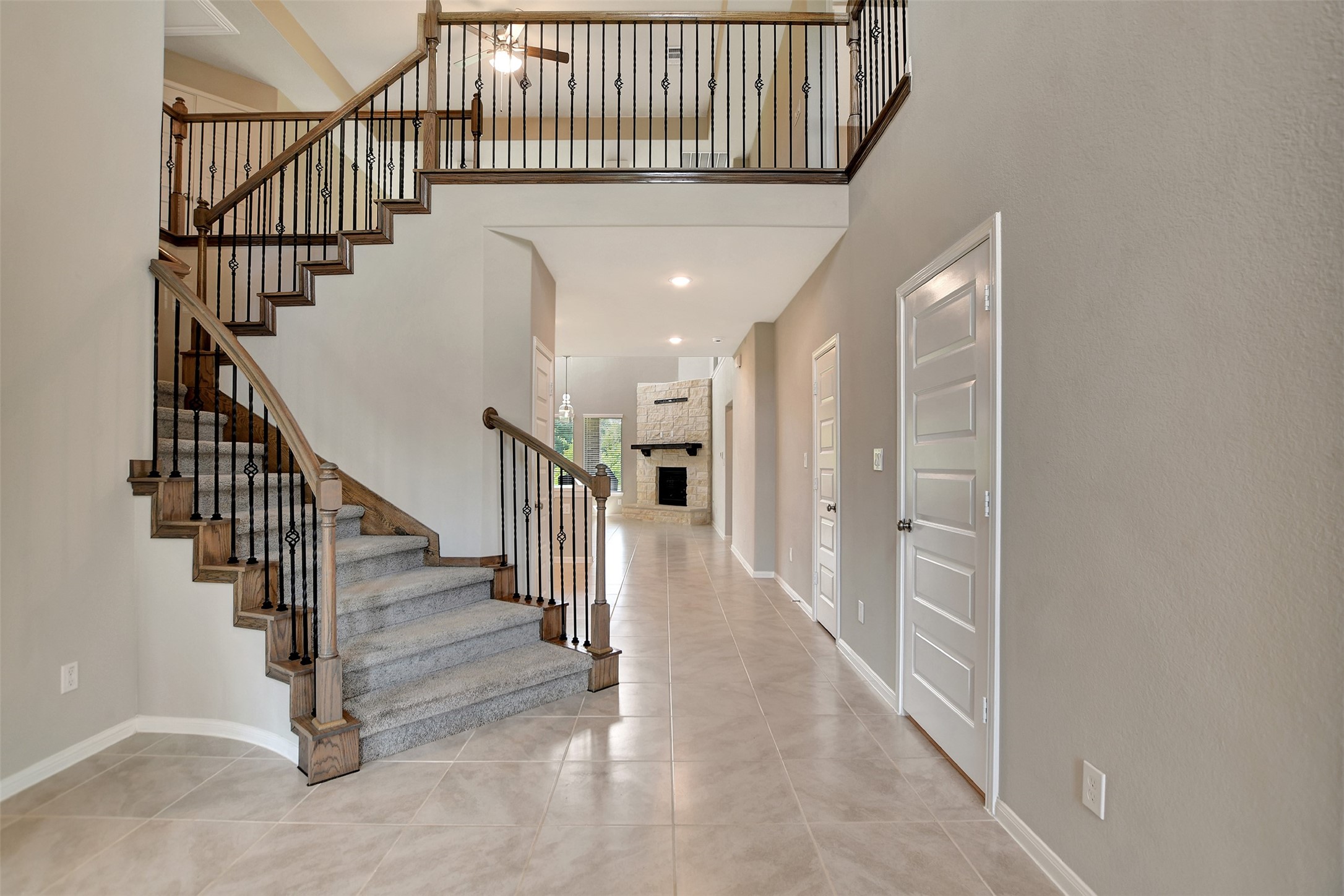 246 Peninsula Point Drive Montgomery, TX 77356 - Photo 3 of 46 Gorgeous black wrought iron stairway spindles