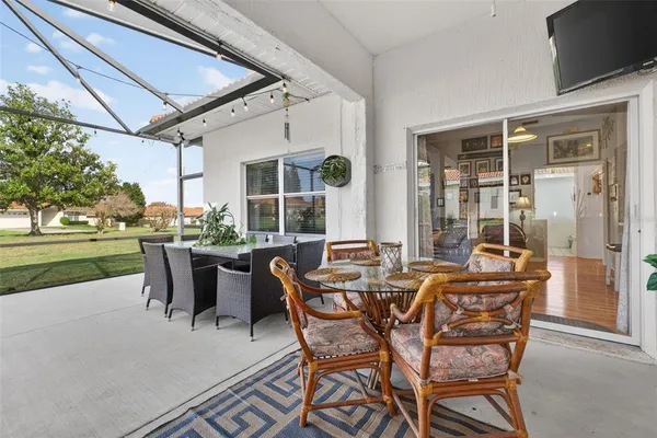 a dining room with furniture mountain view and a potted plant