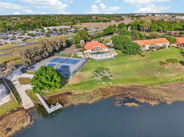 a aerial view of a house with a yard