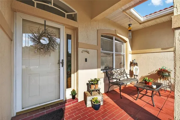 a living room with furniture and a table