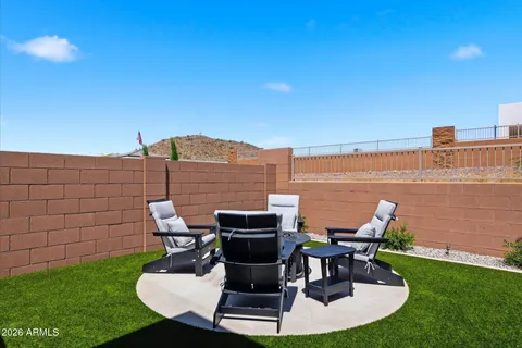 a view of a terrace with yard
