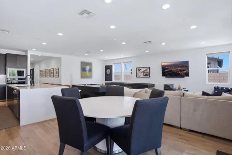 a living room with furniture and a table