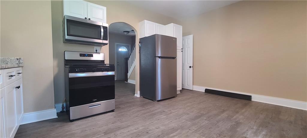 16x12 Kitchen with brand new gas stove, microwave, Refrigerator and floor