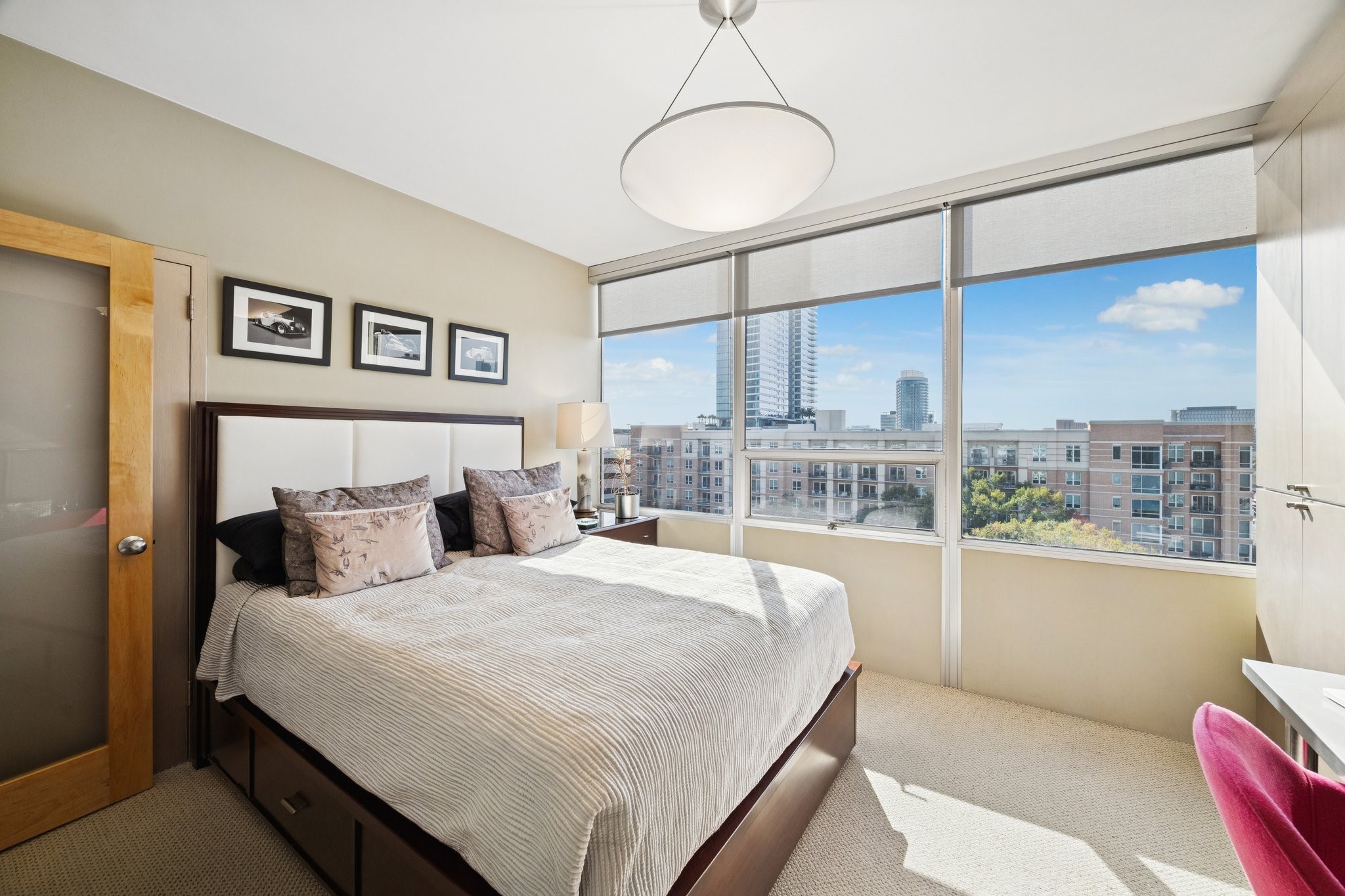 2701 Westheimer Road, Unit 9E Houston, TX 77098 - Photo 15 of 31 Secondary bedroom or versatile office space. This room offers the flexibility to be used as a comfortable bedroom or a productive workspace, depending on the needs of the home.