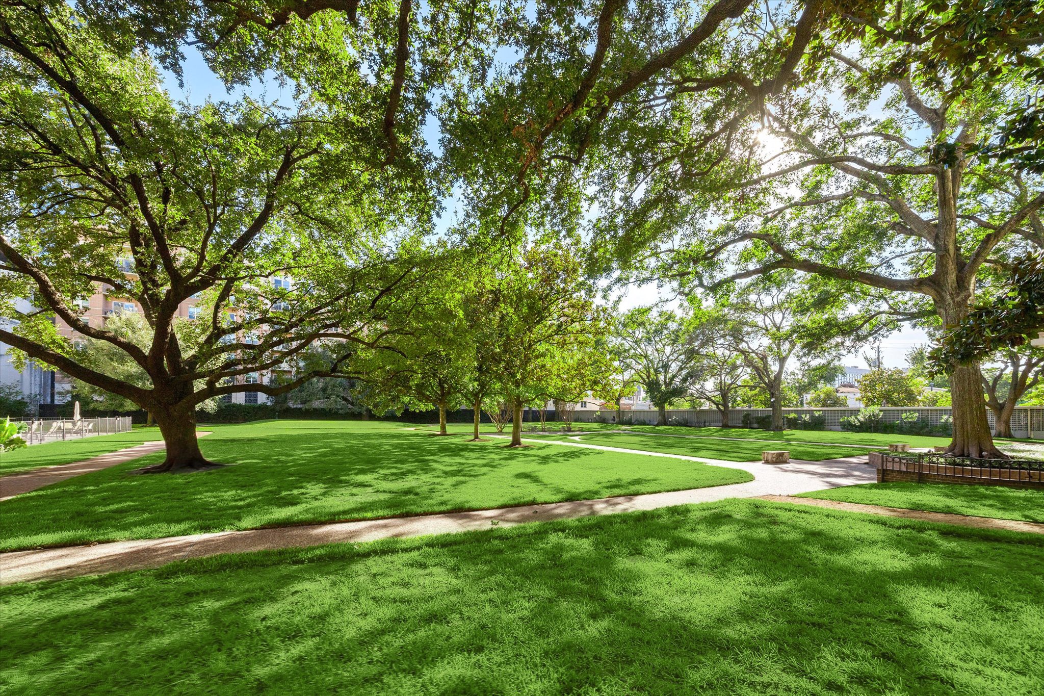 2701 Westheimer Road, Unit 9E Houston, TX 77098 - Photo 25 of 31 This captivating property unfolds across two expansive acres, presenting a picturesque, park-like setting nestled directly in the heart of the highly sought-after "Upper Kirby/River Oaks area.