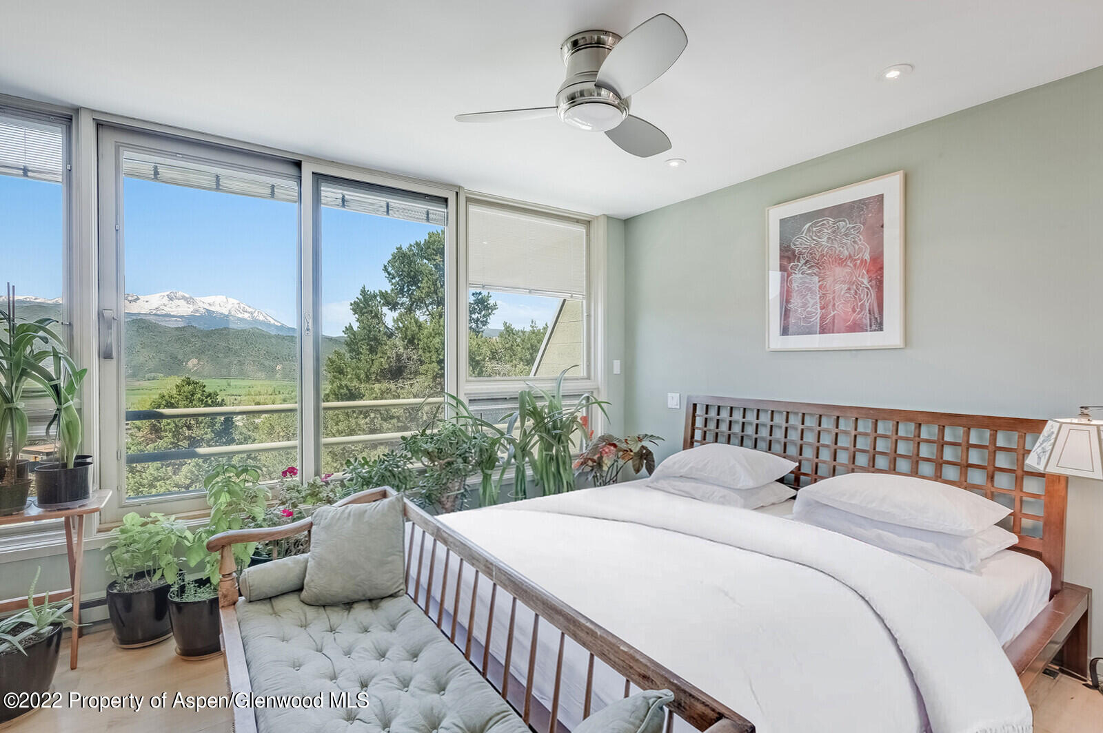 805 Pinon Drive, Unit 1 Basalt, CO 81621 - Photo 7 of 19 a bedroom with a bed and a window