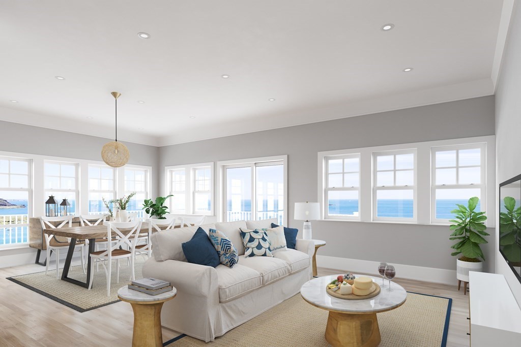 163 Atlantic Road, Unit 1 Gloucester, MA 01930 - Photo 8 of 16 a living room with furniture and a large window