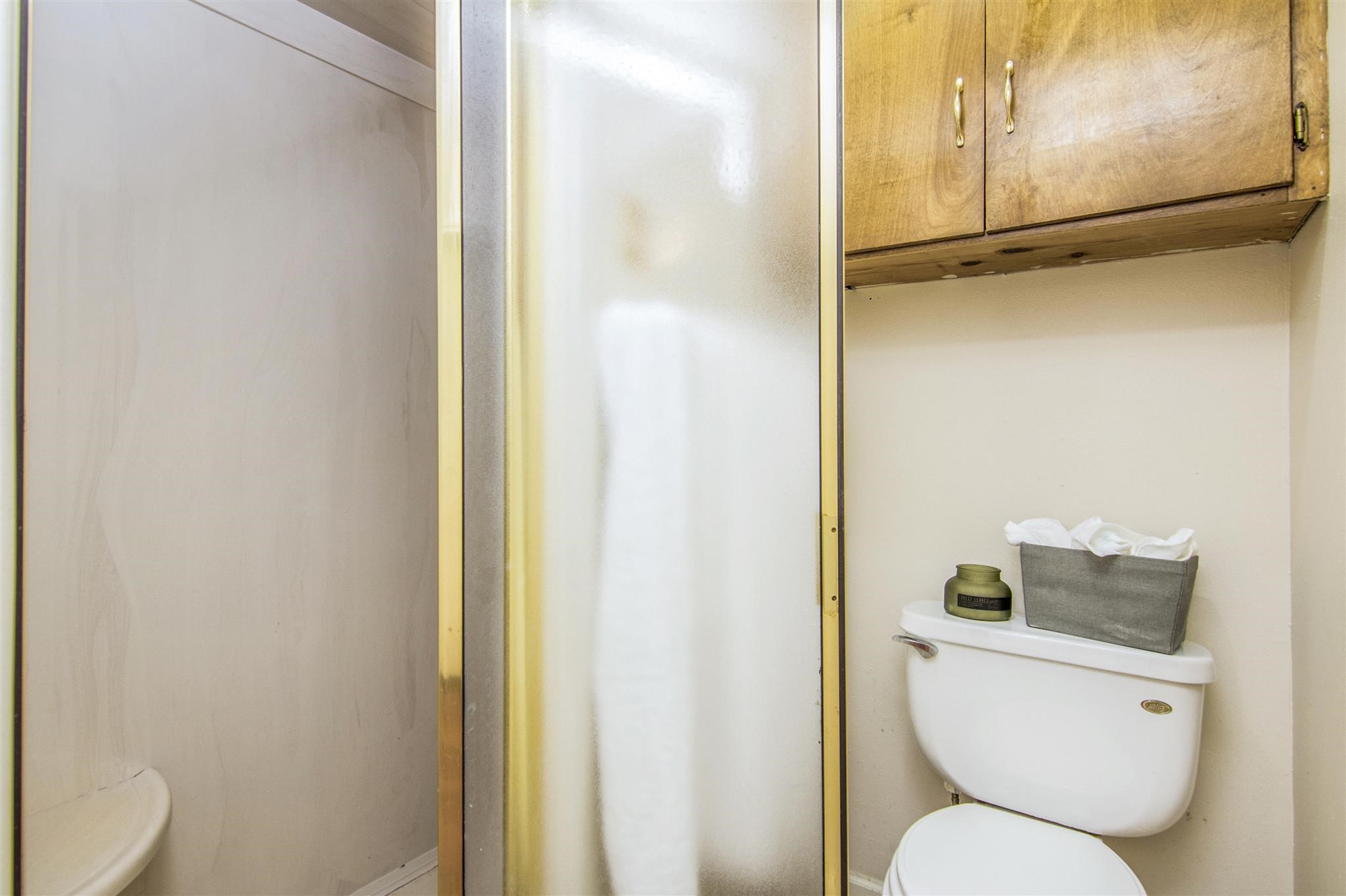 11844 13th Street Santa Fe, TX 77510 - Photo 12 of 17 a bathroom with a toilet and a shower