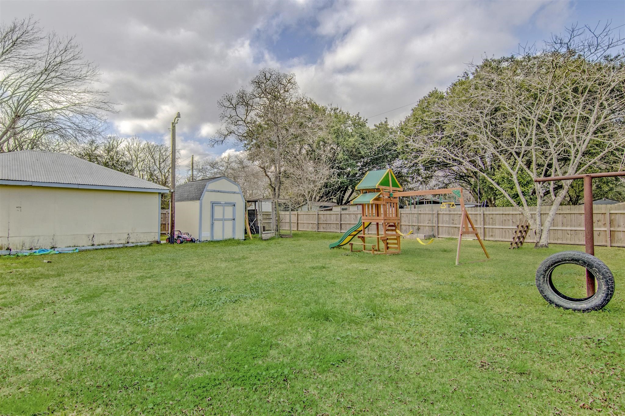 11844 13th Street Santa Fe, TX 77510 - Photo 17 of 17 a view of a playground with basketball court