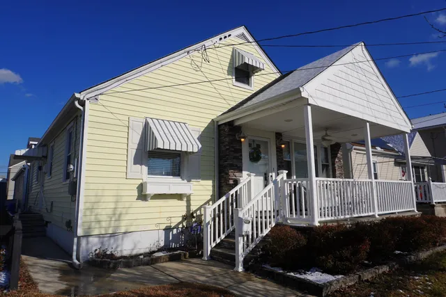 a view of house with deck
