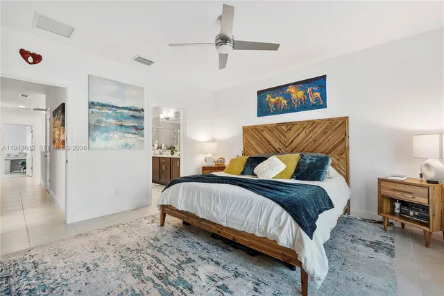 a bathroom with a sink double vanity and a shower