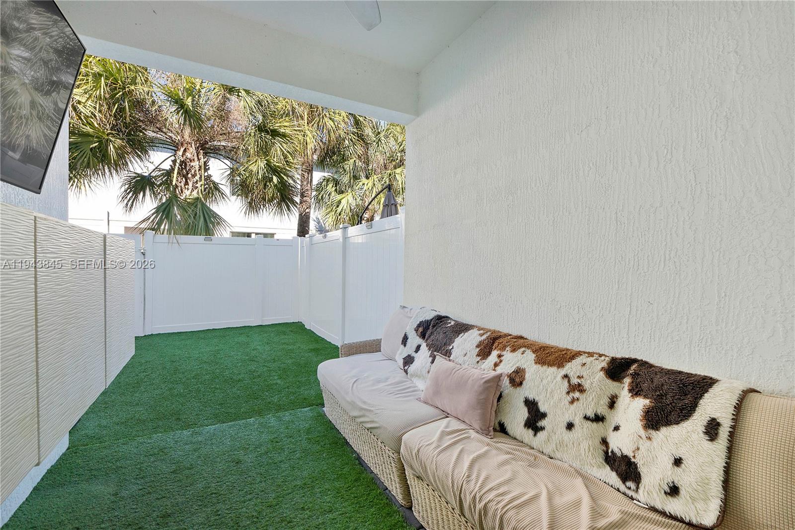 1827 Sandpiper Pointe Place Deerfield Beach, FL 33442 - Photo 36 of 48 a view of a garden