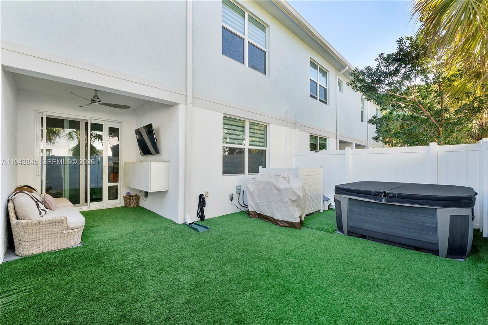 1827 Sandpiper Pointe Place Deerfield Beach, FL 33442 - Photo 38 of 48 a view of a house with backyard