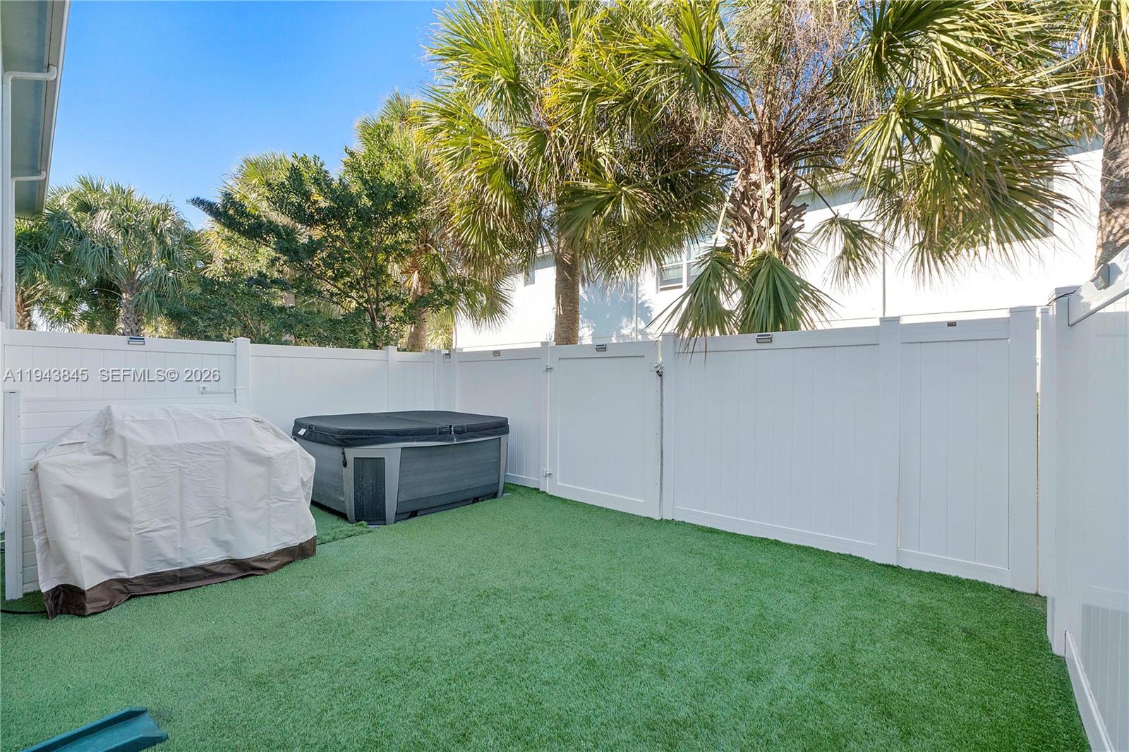 1827 Sandpiper Pointe Place Deerfield Beach, FL 33442 - Photo 39 of 48 a view of a backyard
