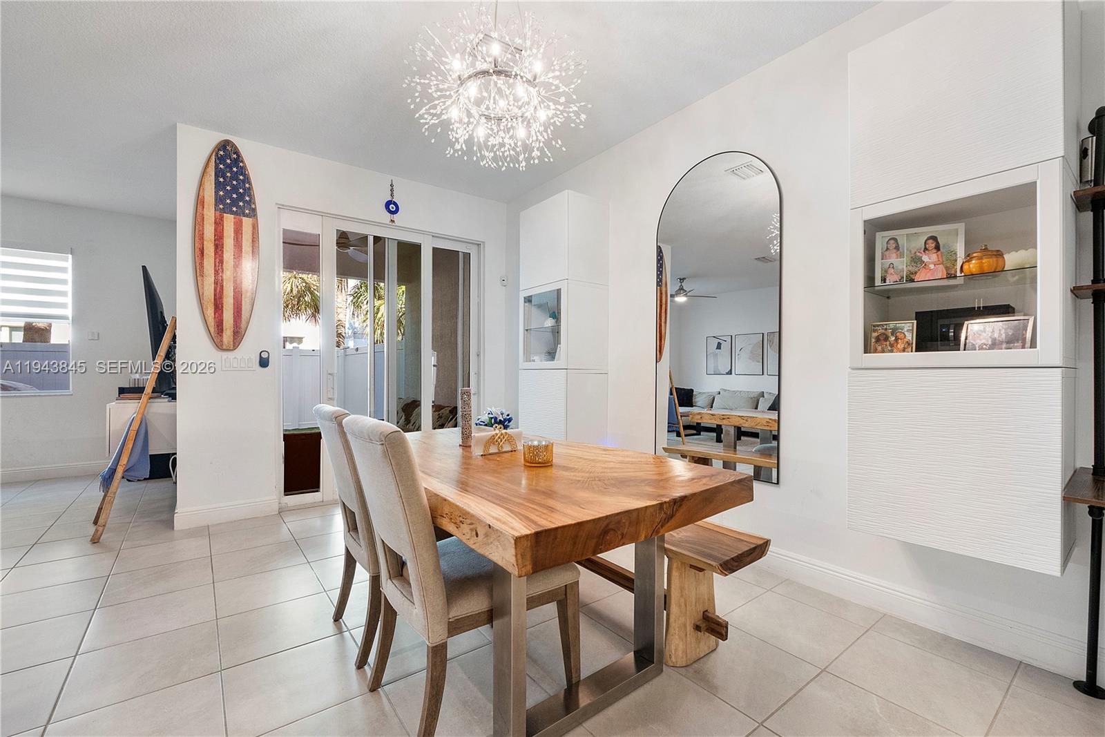 1827 Sandpiper Pointe Place Deerfield Beach, FL 33442 - Photo 9 of 48 a view of a dining room with furniture