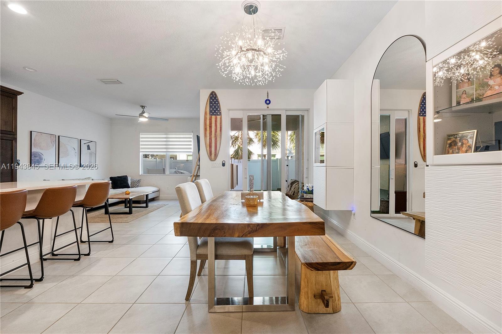 1827 Sandpiper Pointe Place Deerfield Beach, FL 33442 - Photo 10 of 48 a dining room with furniture and window