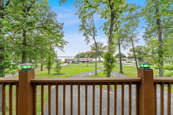 a view of a porch with a yard